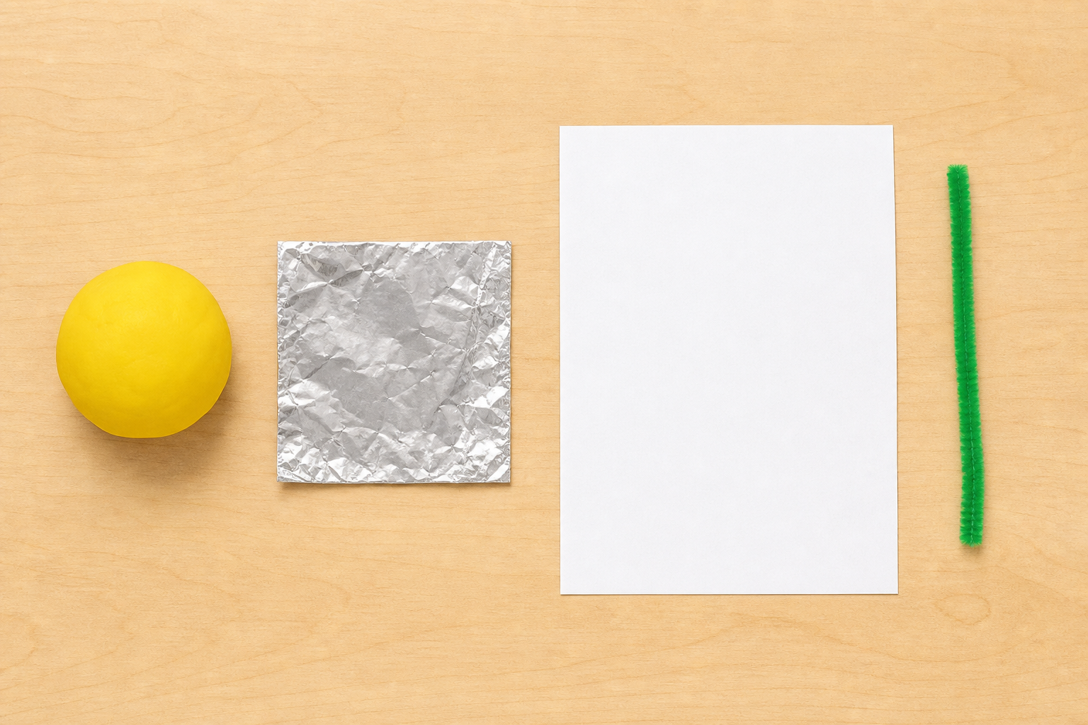 The four materials laid out ready to push, squash and bend