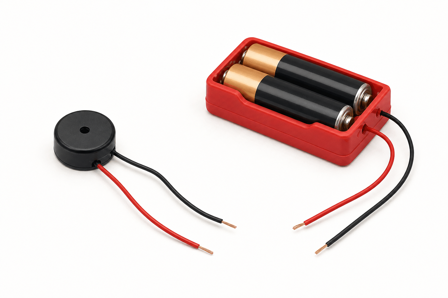 The real buzzer and battery pack children will use, shown plainly and close