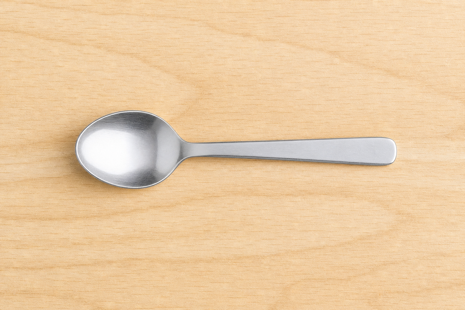 The spoon itself, close up, as the object the class discusses first